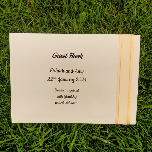 Cream and gold organza guest book