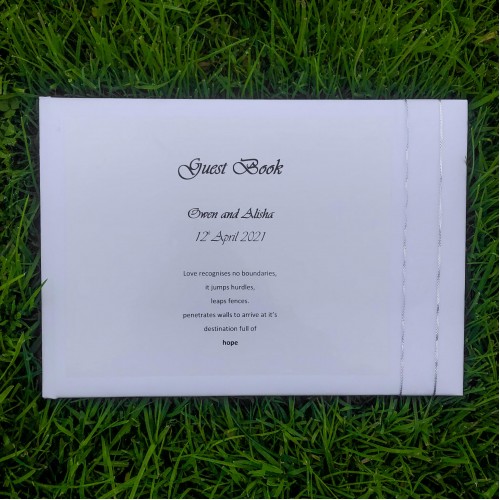 White and silver organza guest book