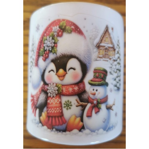 Penguin with snowman moneybox